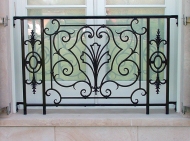 Architect: Robert A. M. Stern. Steel window grilles.