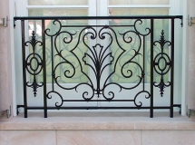 Architect: Robert A. M. Stern. Steel window grilles.