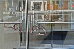 Architect: Steven Holl. Bronze door handles.