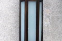 Architect: John Murray. Bronze with glass.