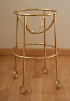 Architect: Ike Kliggerman & Barkley. Polished brass stool.