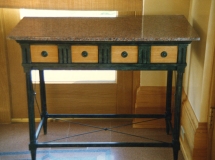 Architect: Robert A. M. Stern. Bronze, granite, and white oak table.
