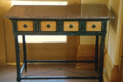 Architect: Robert A. M. Stern. Bronze, granite, and white oak table.