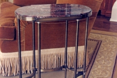 Architect: Ike Kliggerman. Bronze with silver gilt details, and marble.