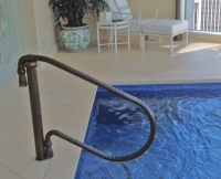 Architect: Robert A. M. Stern. Bronze railing.