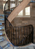 Architect: Galambos. Steel and cast iron railing.