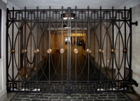 Architect: John Murray. Steel and bronze gates.