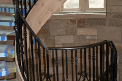 Architect: Galambos. Steel and cast iron railing.