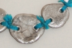 silver and embroidery thread