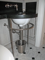 Architect: Basil Walter. Stainless steel vanity.